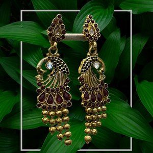 Peacock gold earrings with red & white stones